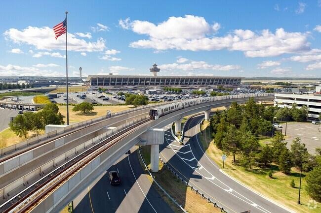 Dulles Mobile Lounges Retired After 60 Years: Iconic Airport Transport Ends 2 Washington Dulles AeroTrain replacing Dulles mobile lounges during airport modernization