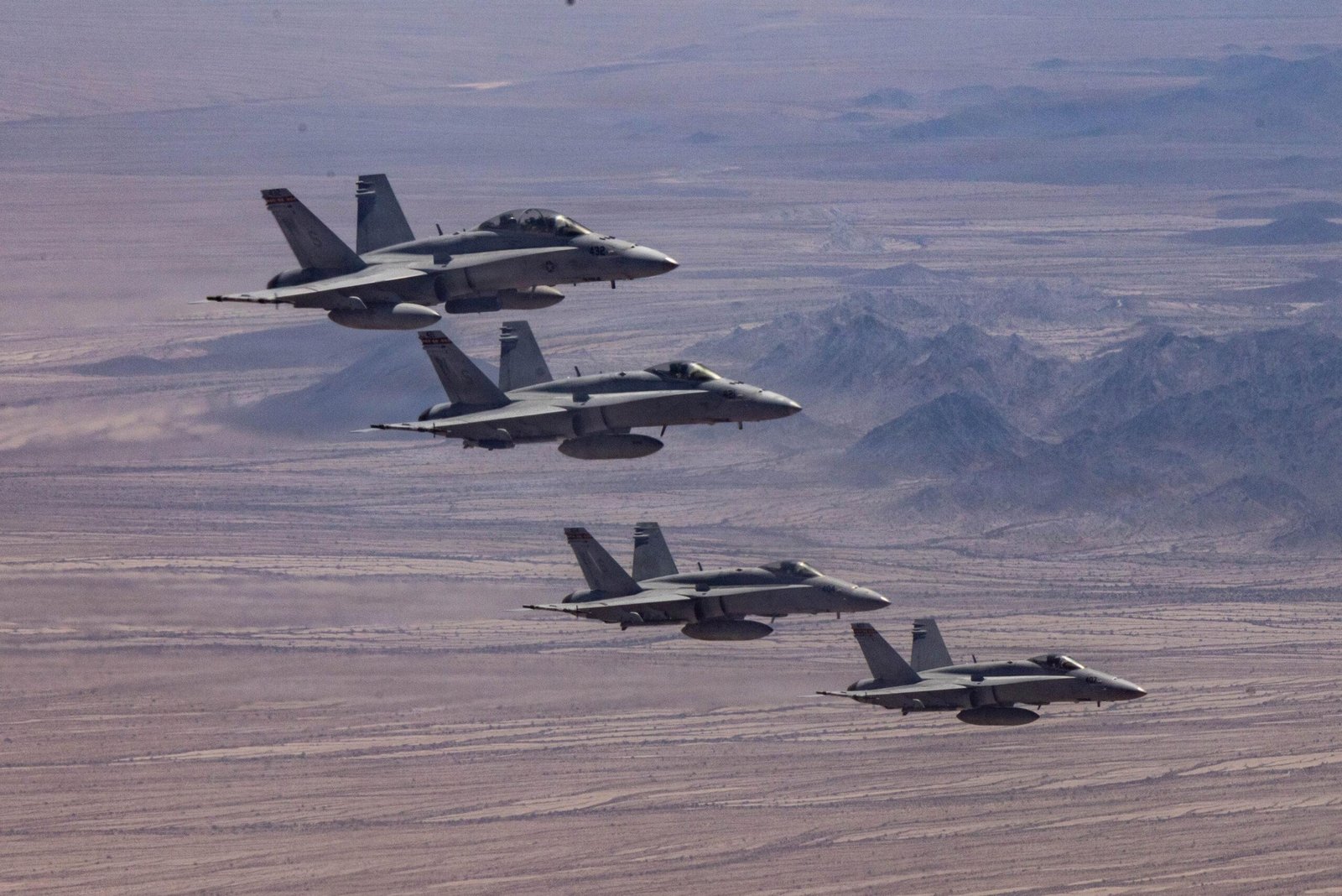 F-18 pilot survives crash — 3rd Marine Aircraft Wing Hornets in formation