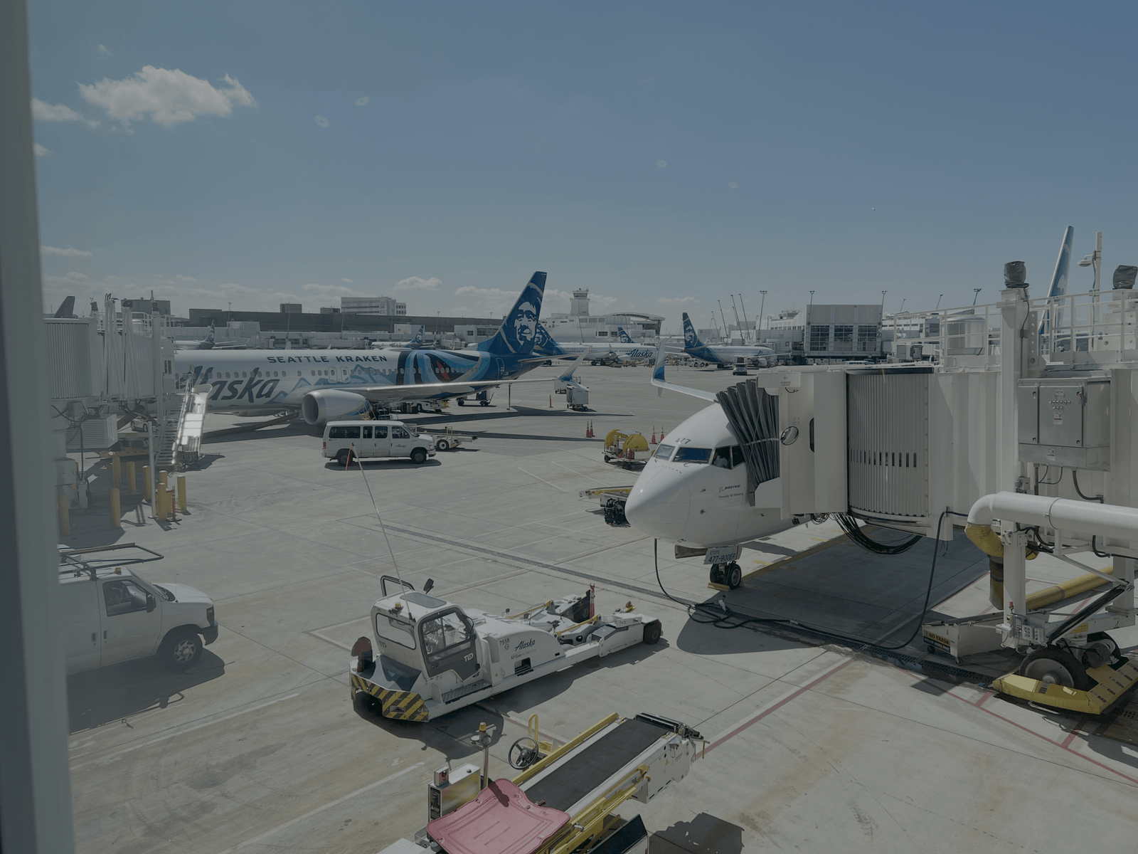 Airplanes at airport gate during ground operations amid FAA flight disruptions