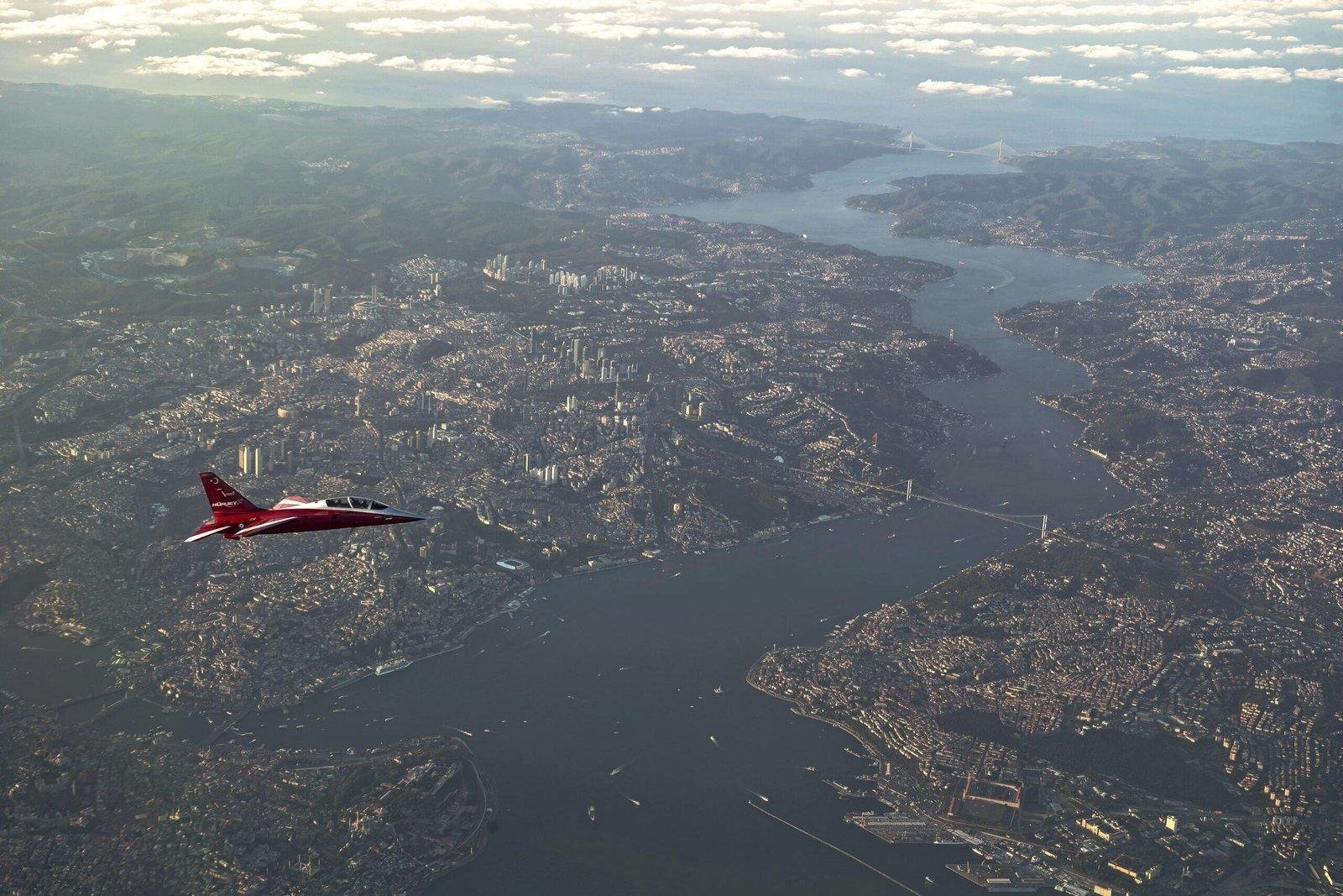 HÜRJET supersonic jet trainer in flight over the Bosphorus in Istanbul