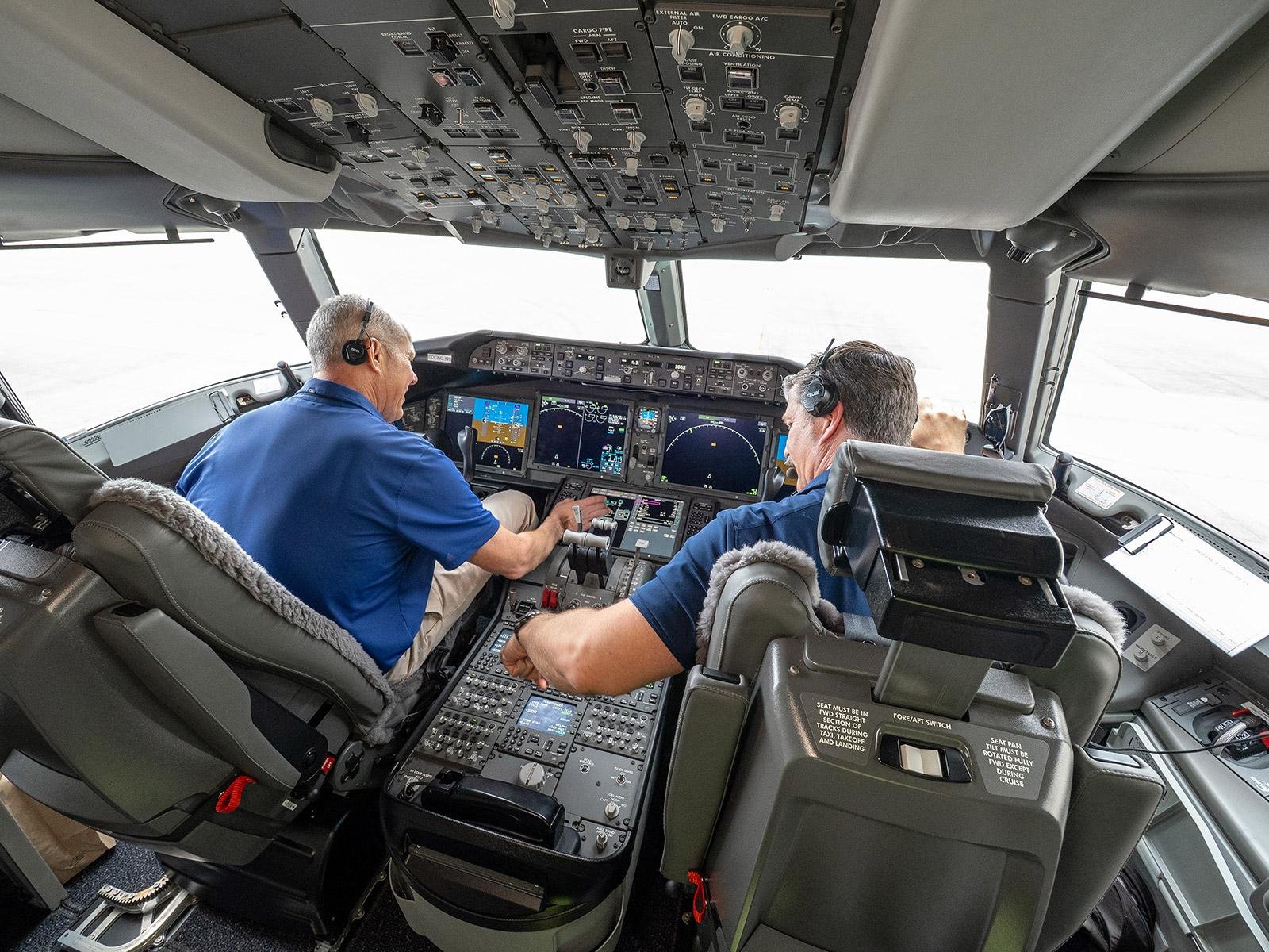 Lufthansa Boeing 777-9 flight deck during testing with two Boeing pilots at the controls