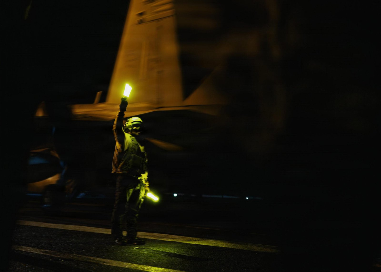 Flight deck director USS George Washington night flight operations