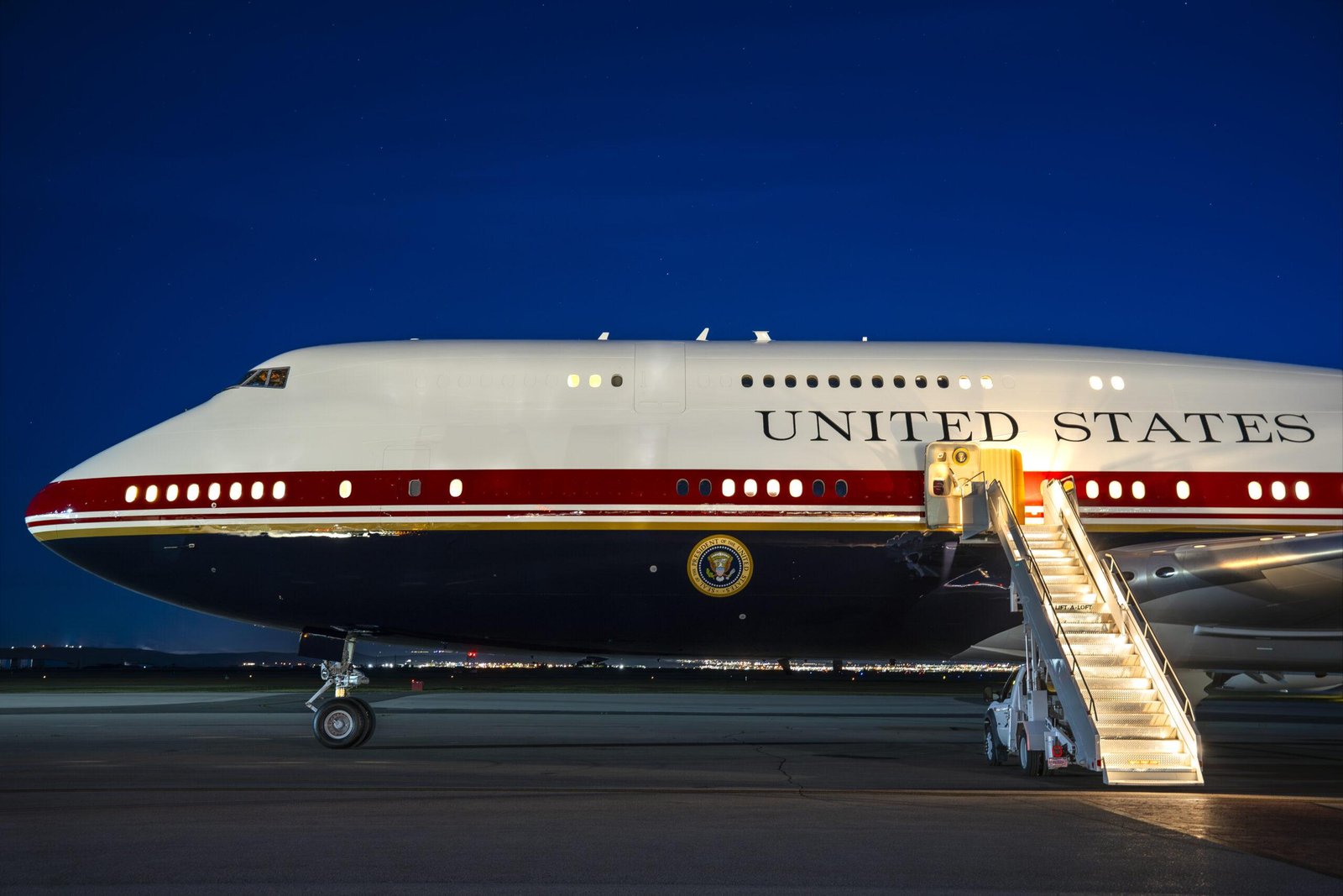 The Qatari-donated Boeing 747-8 presidential aircraft on the tarmac at night