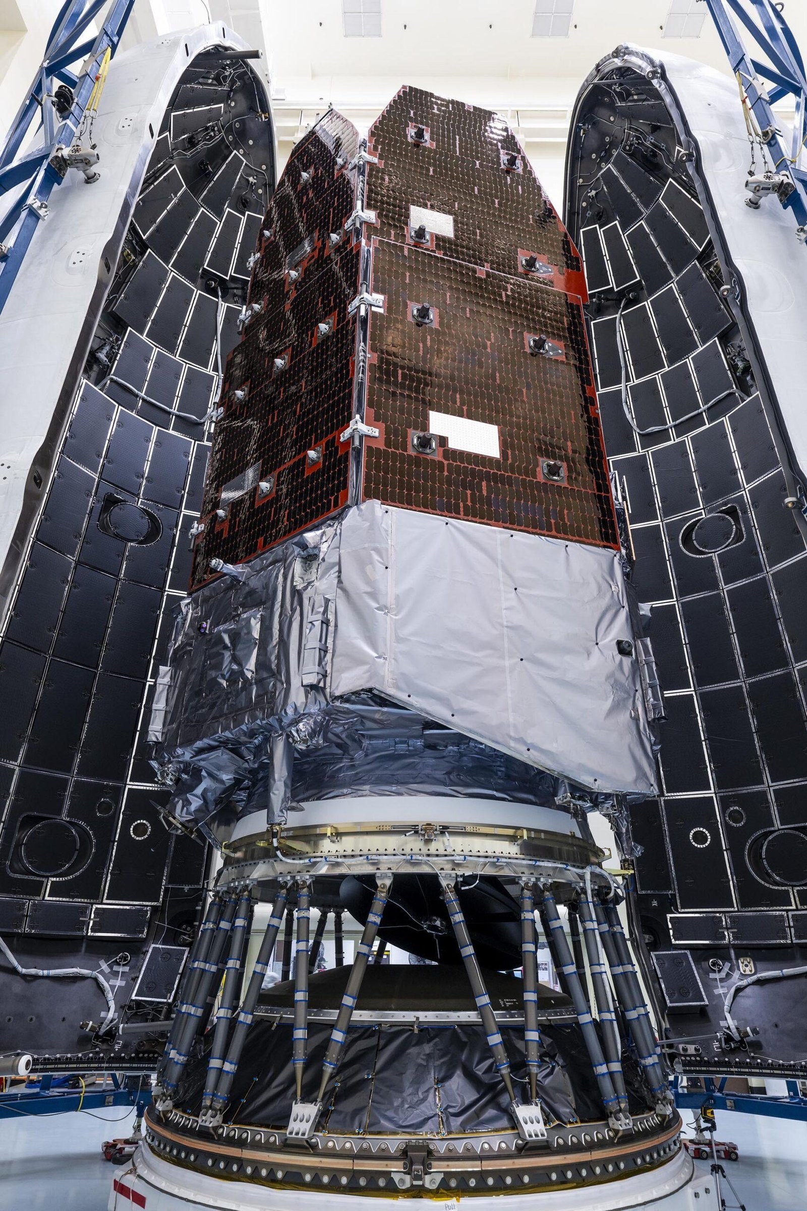 NASA's Nancy Grace Roman Space Telescope being enclosed inside the SpaceX Falcon Heavy payload fairing