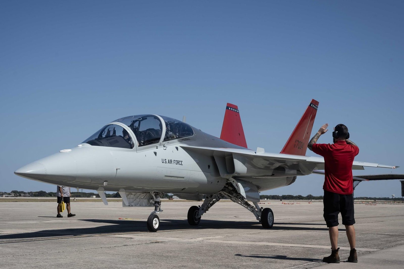 Third T-7A Red Hawk Delivery — Marshaled to Parking Ground crew marshals T-7A Red Hawk into parking at Joint Base San Antonio-Randolph