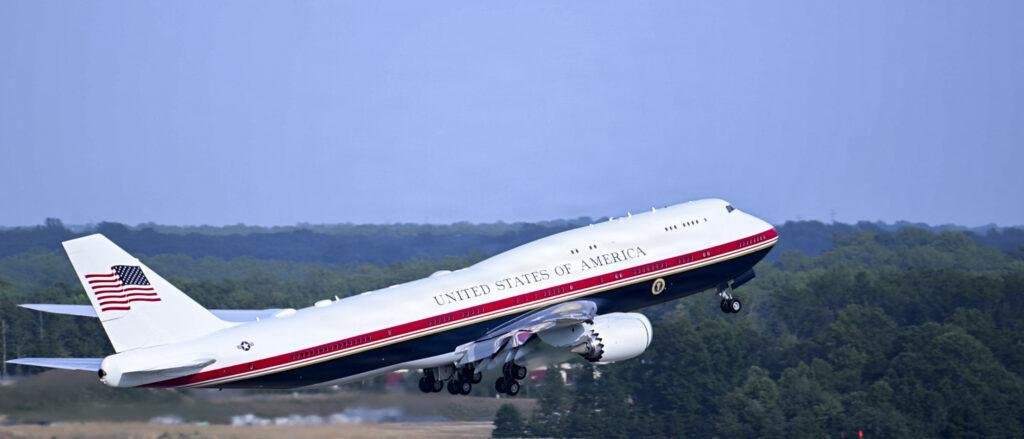 New Air Force One Boeing 747 climbing out after takeoff against clear sky