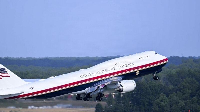 New Air Force One Boeing 747 climbing out after takeoff against clear sky