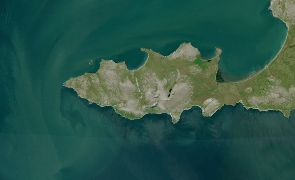 Satellite image of the remote Cape Newenham peninsula on Alaska's Bering Sea coast, site of the Aug. 20 charter plane crash