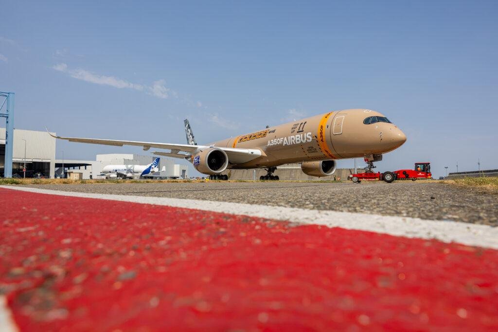 Airbus A350F MSN700 being towed during rollout at the Airbus facility
