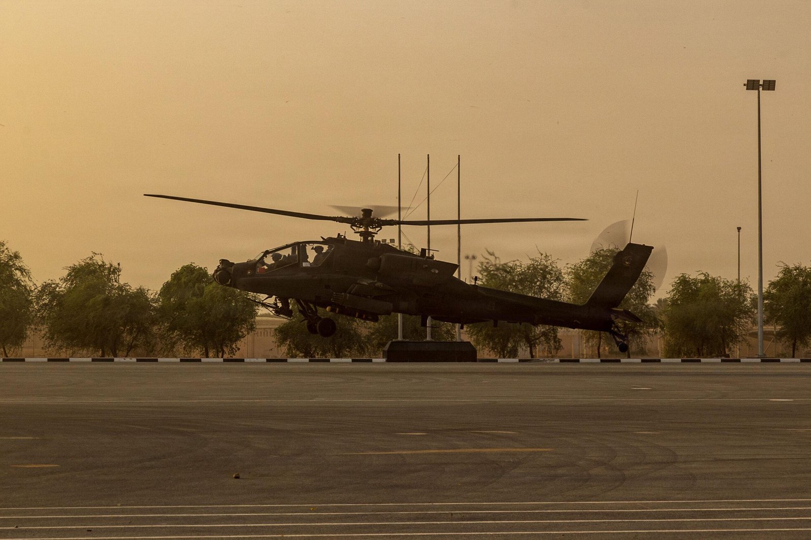 CIRCM contract: U.S. Army AH-64 Apache attack helicopter equipped with the missile defense system lands during FARP operations