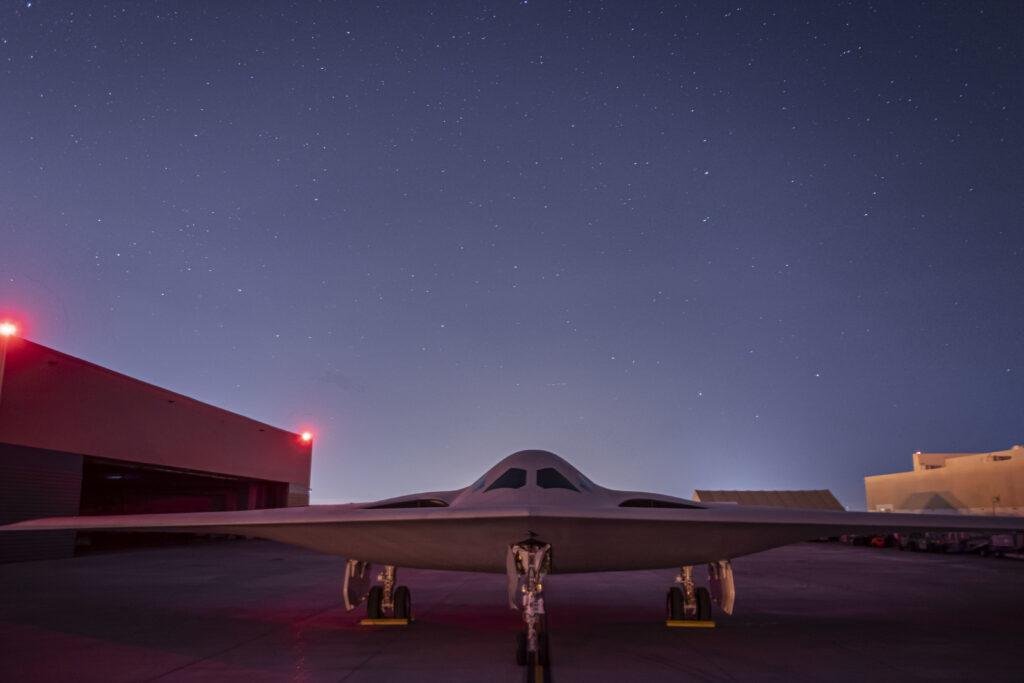 Northrop Grumman B-21 Raider stealth bomber viewed from the side at its December 2022 public unveiling in Palmdale, California