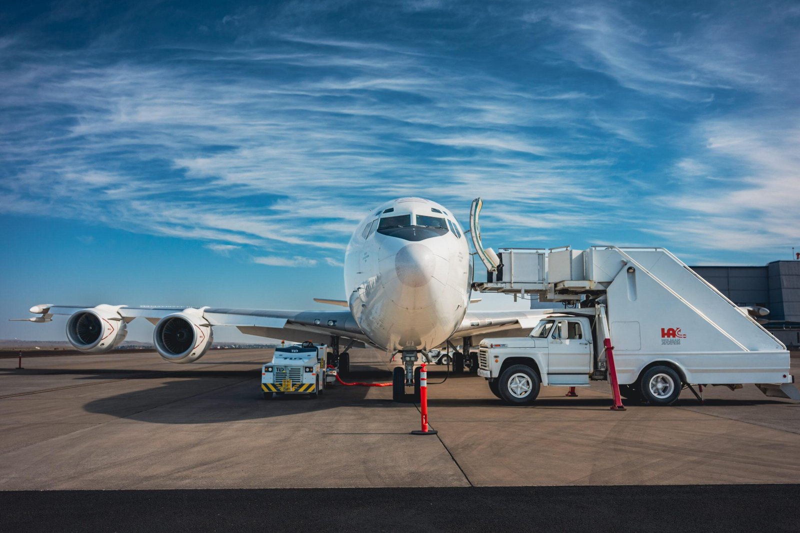 A U.S. Navy E-6B Mercury airborne command post aircraft sits on a tarmac near Malmstrom Air Force Base
