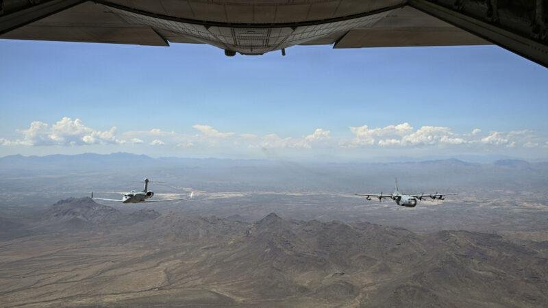 EC-130H final flight: EA-37B and EC-130H Compass Call in close formation over Arizona