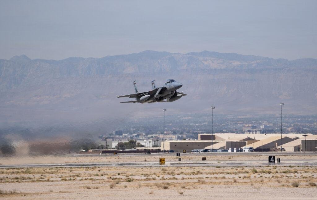 Oregon Air National Guard F-15EX Eagle II climbs out after takeoff from Nellis Air Force Base during live-bomb qualification training