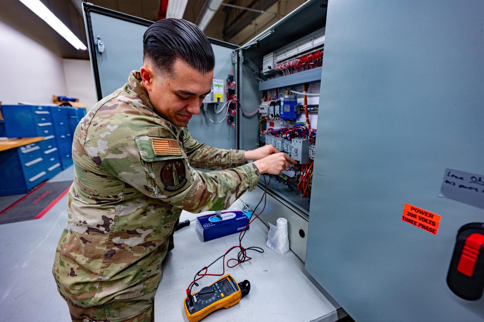 A missile maintenance team chief demonstrates routine tasks, the kind of work central to the F.E. Warren PCB contamination response
