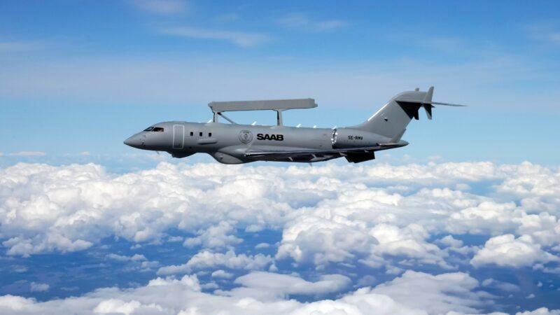 Saab GlobalEye airborne early warning and control aircraft flying above the clouds