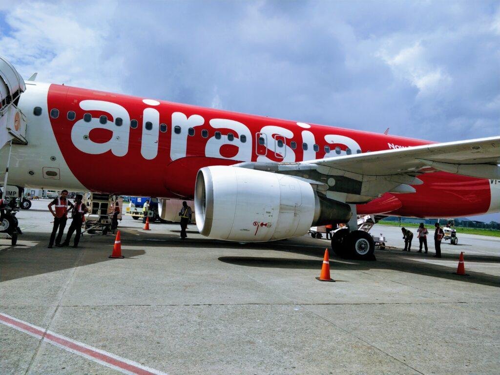 AirAsia funding support story illustrated by an AirAsia Airbus A320 at Guwahati Airport in 2018