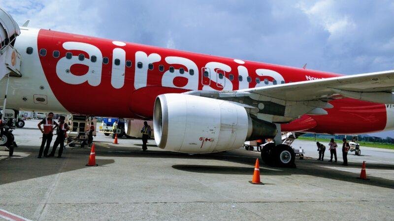 AirAsia funding support story illustrated by an AirAsia Airbus A320 at Guwahati Airport in 2018