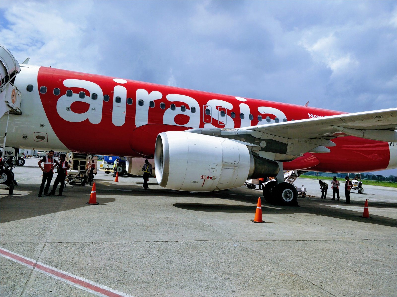 AirAsia funding support story illustrated by an AirAsia Airbus A320 at Guwahati Airport in 2018