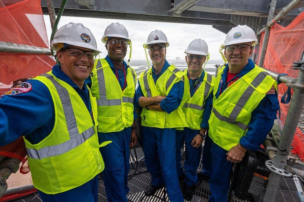 NASA Artemis III crew with backup astronaut Bob Hines visiting Launch Complex 39A in September 2026.