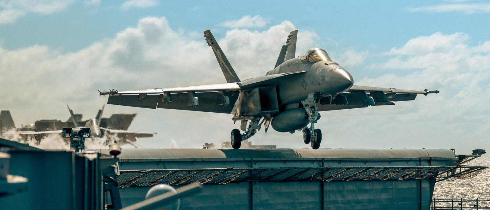 F/A-18E Super Hornet launches from USS Theodore Roosevelt during Pacific flight operations.