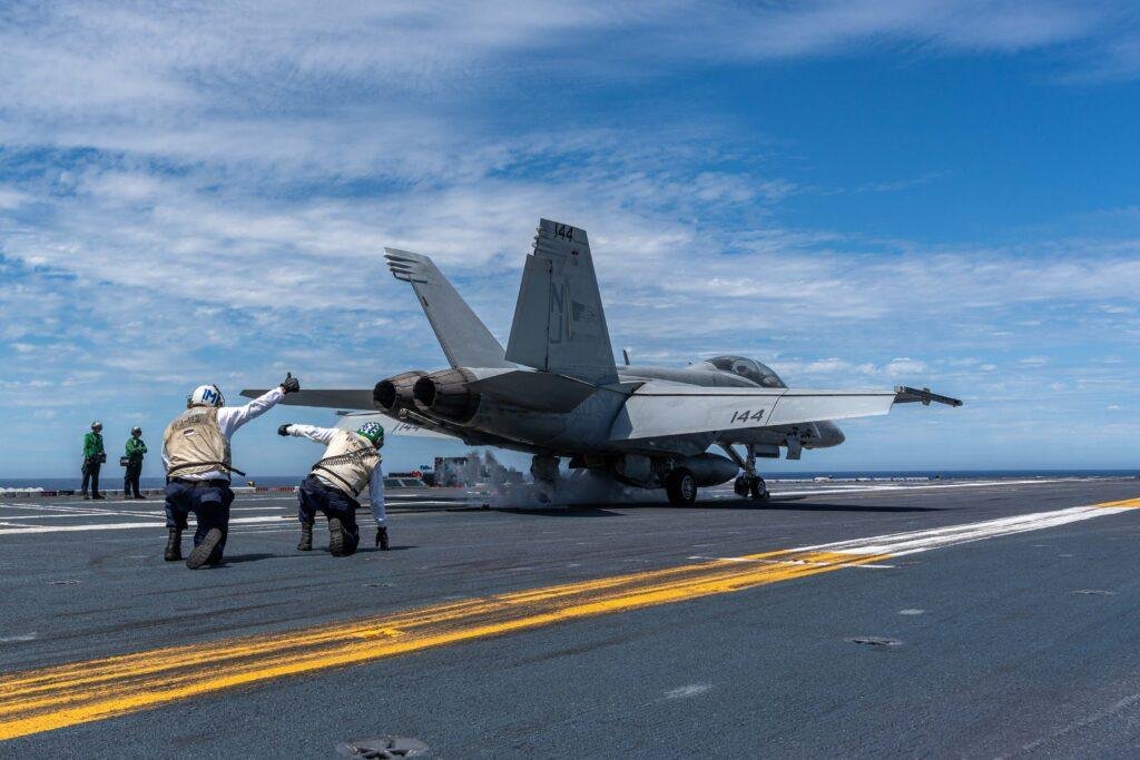 US Navy F/A-18E Super Hornet preparing for launch aboard USS Theodore Roosevelt during flight operations in September 2026