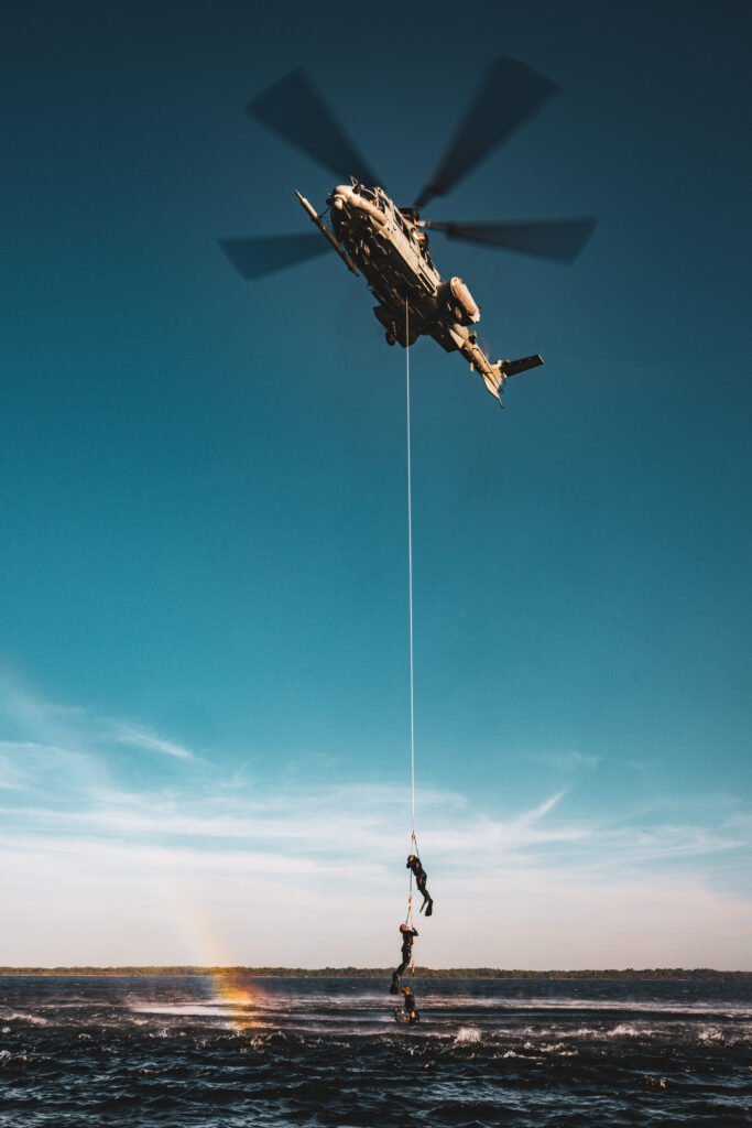 Romania H225M helicopters order illustrated by a French Air and Space Force H225M flying over coastal waters.