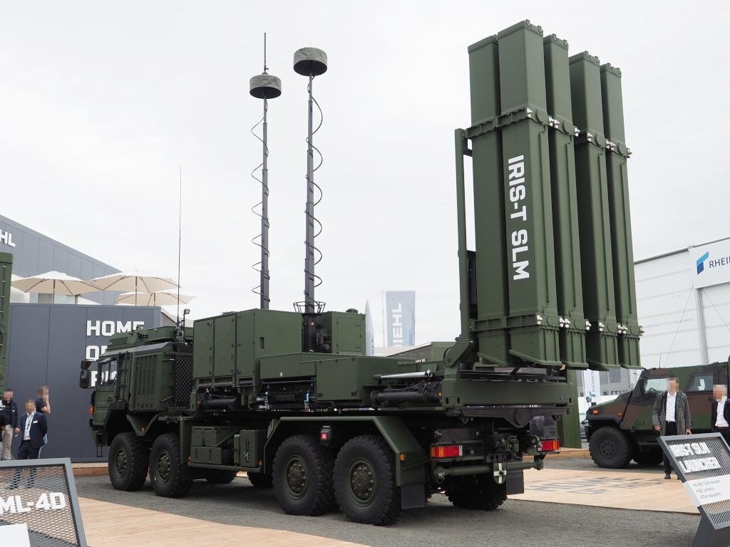 Airbus NATO air defense article featuring an IRIS-T SLM missile launcher displayed at ILA Berlin 2024.