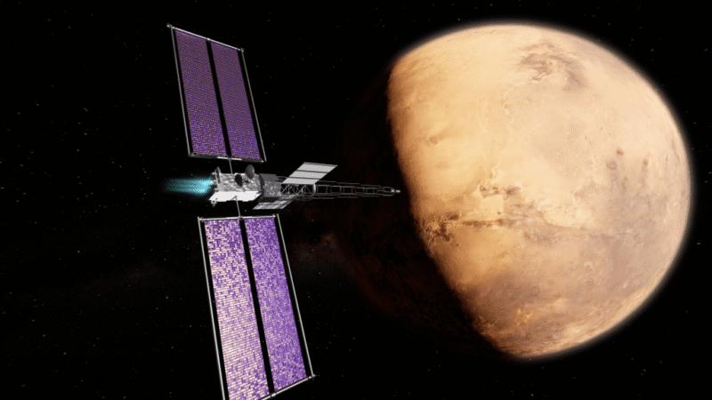 SR-1 Freedom mission illustrated by NASA spacecraft with large purple solar panels approaching Mars