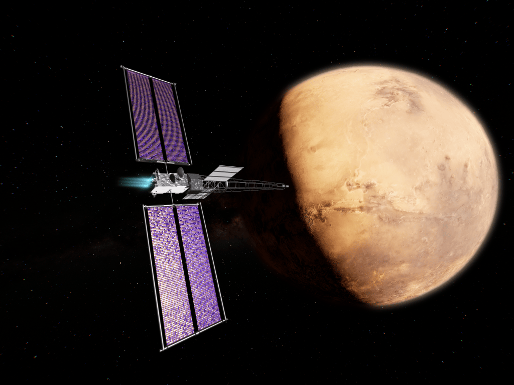 SR-1 Freedom mission illustrated by NASA spacecraft with large purple solar panels approaching Mars