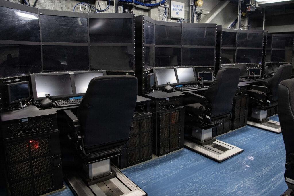 Unmanned air warfare center aboard the USS Ronald Reagan, where air vehicle pilots will control the MQ-25A