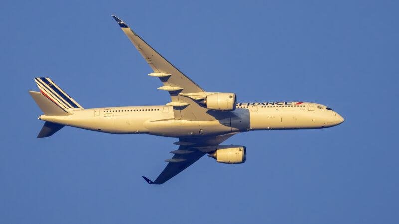 Airbus September deliveries article illustrated by an Air France Airbus A350-900 flying near Washington Dulles Airport in July 2025.