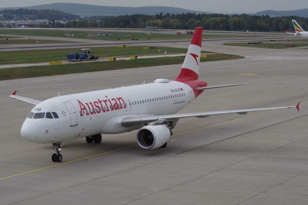 Austrian Flight Diversion illustrated by an Austrian Airlines Airbus A320-214, registration OE-LBU, at Zurich Airport.