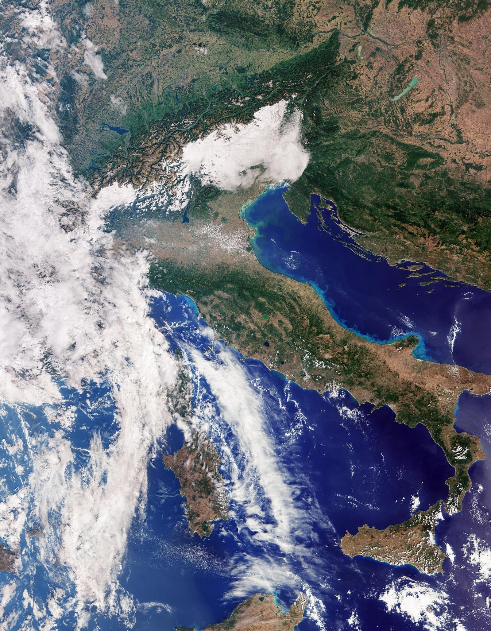 Sentinel-3C natural-color satellite image of Italy, the Alps and the Adriatic Sea, with cloud over the Tyrrhenian Sea and Sardinia and Sicily visible