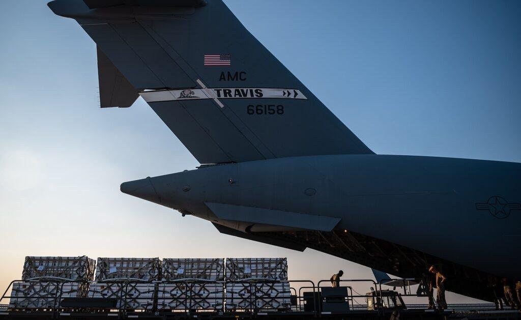 U.S. Air Force personnel loading a C-17 transport aircraft, file photo illustrating Boeing logistics contract supply-chain context