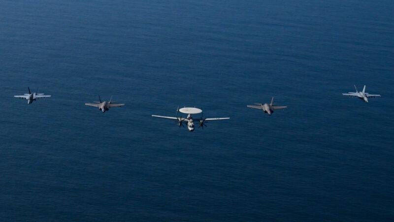 Carrier Air Wing 9 aircraft fly in formation over the Arabian Sea during the USS Abraham Lincoln deployment in February 2026.