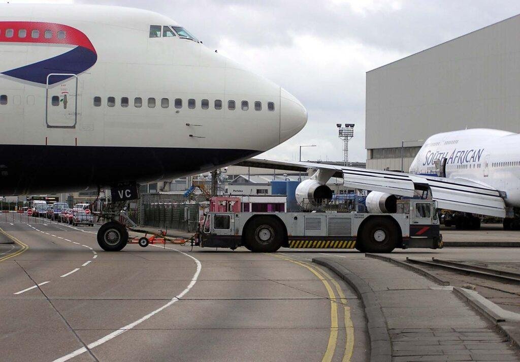 Ground-handling tug pulling a British Airways Boeing 747 at Heathrow, file photo illustrating dnata ground equipment investment