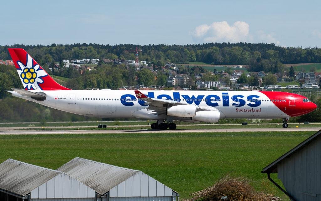 Edelweiss A340 Return illustrated by Airbus A340-300 HB-JMC operating at Zurich Airport in Switzerland.