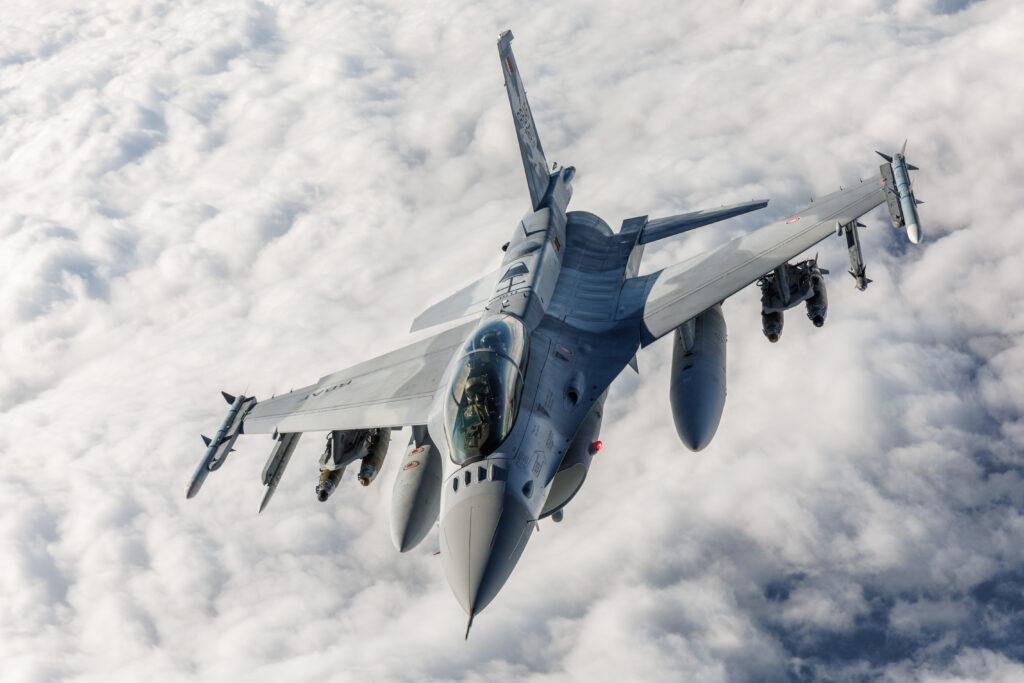 F-16 Block 70 fighter taking fuel from a KC-135 tanker during a test flight from Edwards Air Force Base