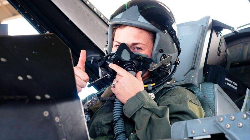 FAA Flight Deck Training illustrated by an FAA air traffic controller participating in a military aircraft familiarization flight.