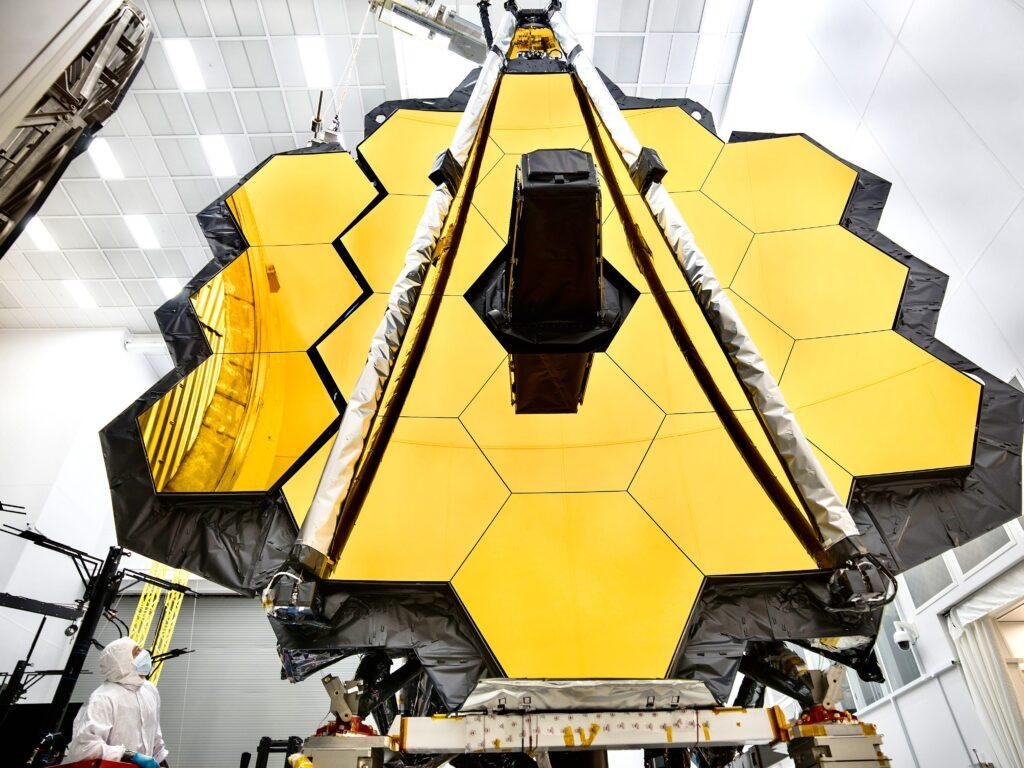 James Webb Space Telescope gold primary mirror inside a NASA cleanroom before launch in 2017.