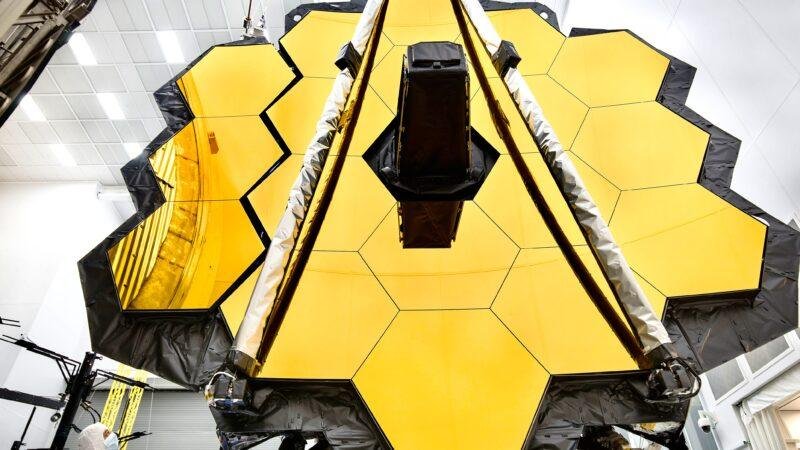 James Webb Space Telescope gold primary mirror inside a NASA cleanroom before launch in 2017.