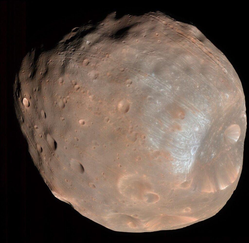 Japan Martian Moons mission article illustrated by a NASA Mars Reconnaissance Orbiter close-up of Phobos from 2008.