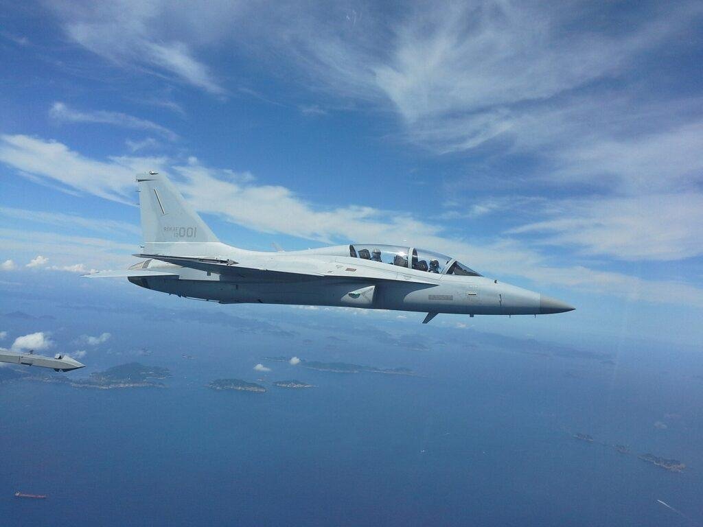 FA-50 drone formation story illustrated by archival Korea Aerospace Industries FA-50 Flying Eagle test flight photograph