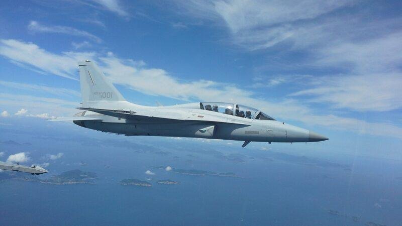 FA-50 drone formation story illustrated by archival Korea Aerospace Industries FA-50 Flying Eagle test flight photograph