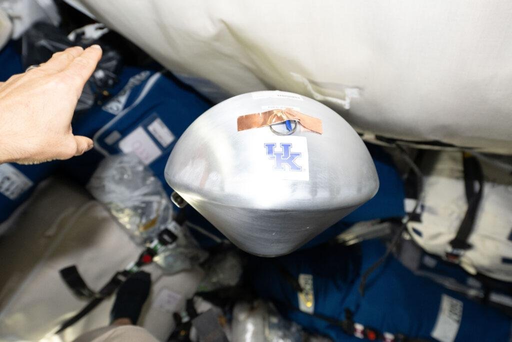 KREPE-3 heat shield capsule floating inside the Cygnus XL cargo spacecraft at the International Space Station on October 7, 2026.