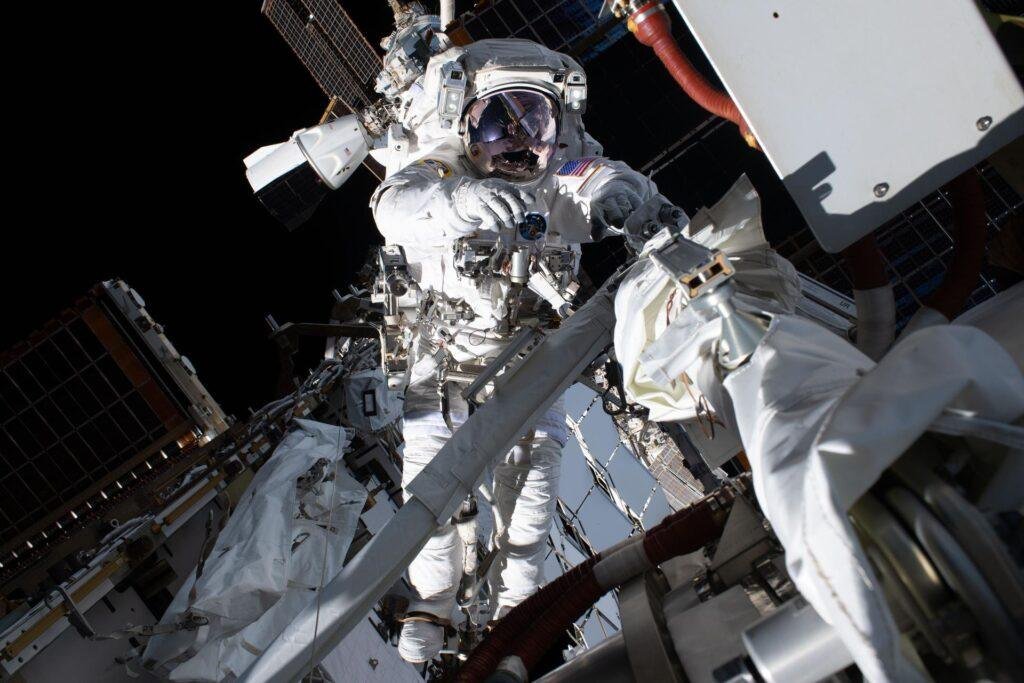 NASA astronaut Anil Menon conducting a spacewalk outside the International Space Station on August 6, 2026, ahead of planned ISS upgrades.