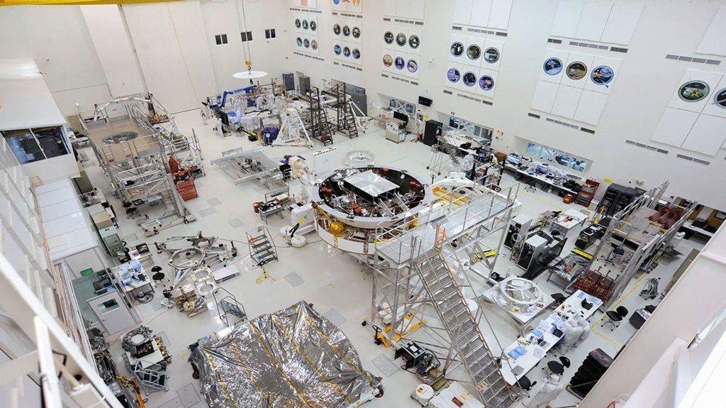 NASA Mars 2020 spacecraft components undergoing assembly in the Jet Propulsion Laboratory clean room.