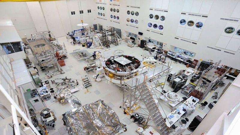 NASA Mars 2020 spacecraft components undergoing assembly in the Jet Propulsion Laboratory clean room.