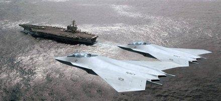 Concept art of two gray stealth fighters marked Navy flying low over the sea near an aircraft carrier